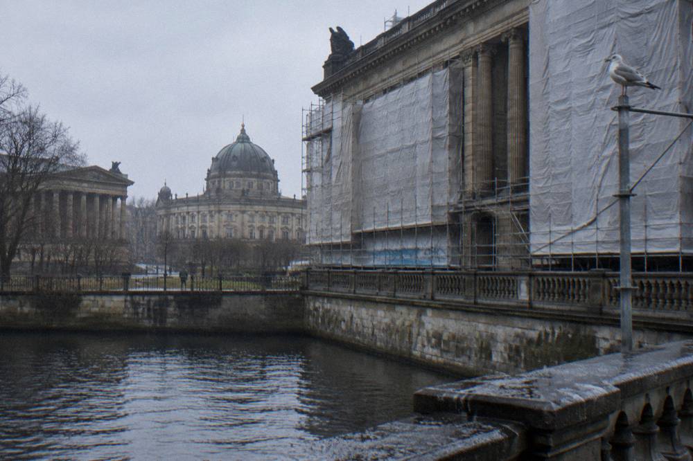 Scaffolding around a grand museum facade under renovation on Museum Island