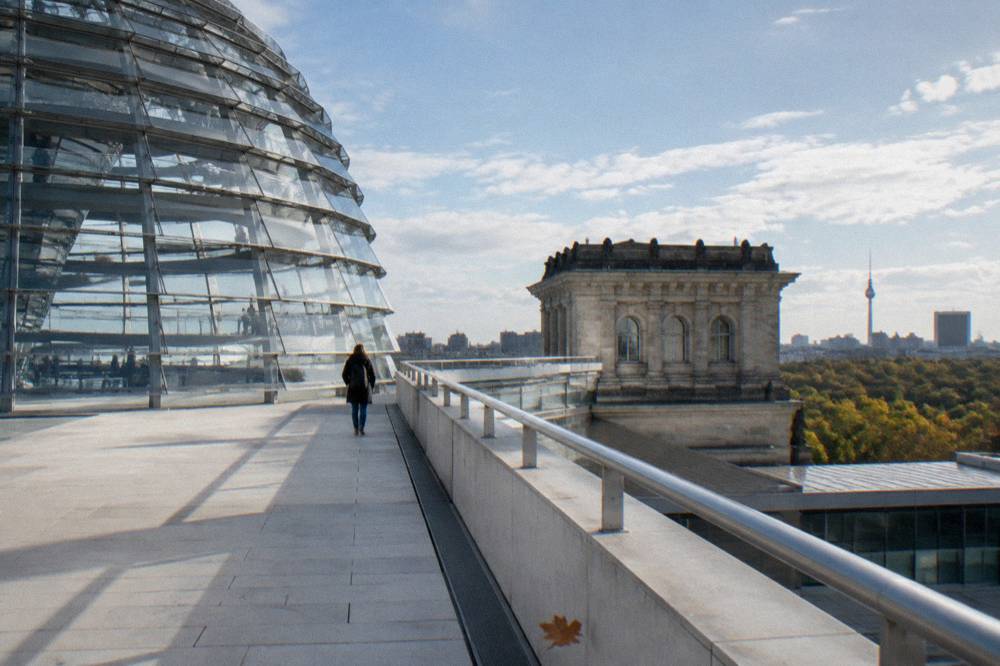 The Reichstag building roof terrace walkway under an open sky