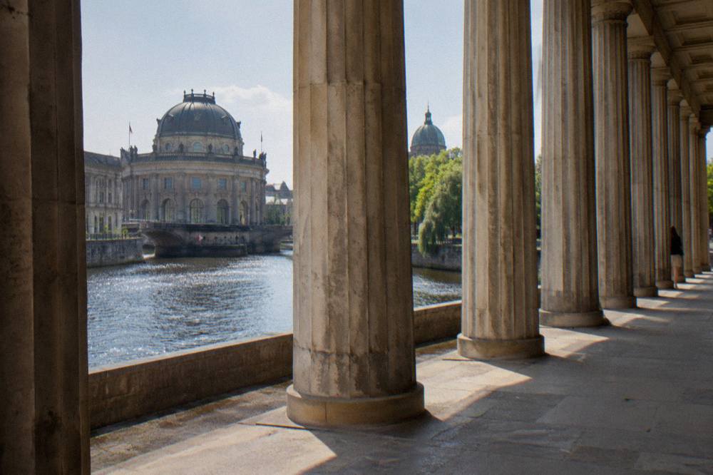 Interior hall of a Berlin museum with stone floors and high ceilings