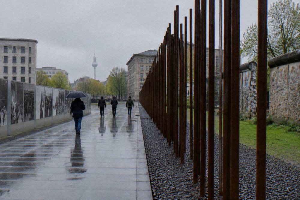 Visitors walking the length of the Bernauer Strasse open-air exhibition