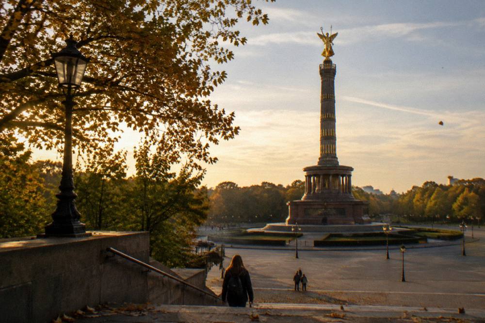 The Victory Column rising above the trees of the Tiergarten with its golden figure catching the light