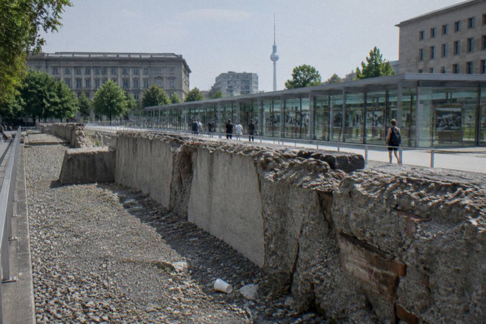 Modern documentation centre building beside an open exhibition trench in Berlin