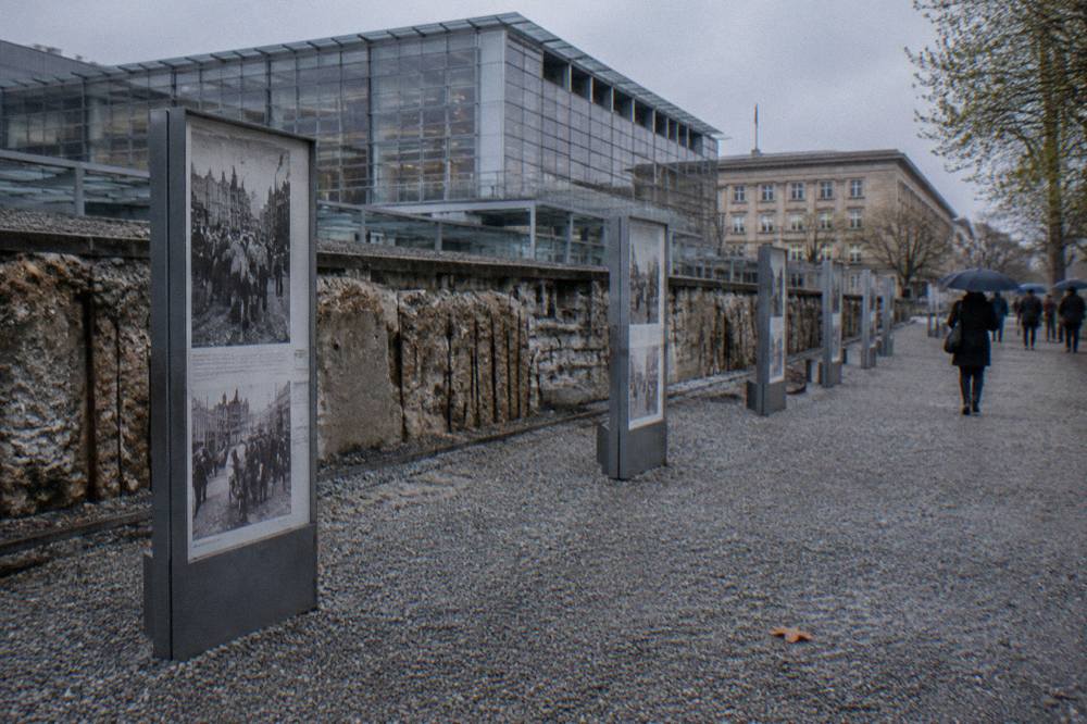 Exhibition hall interior with information panels and overhead lighting